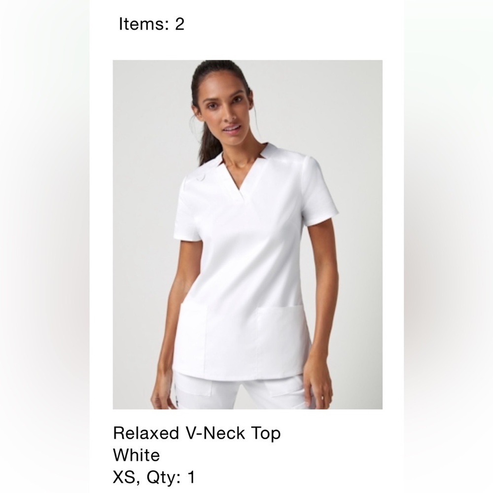 EUC. White Jaanuu Scrub top- SIZE S